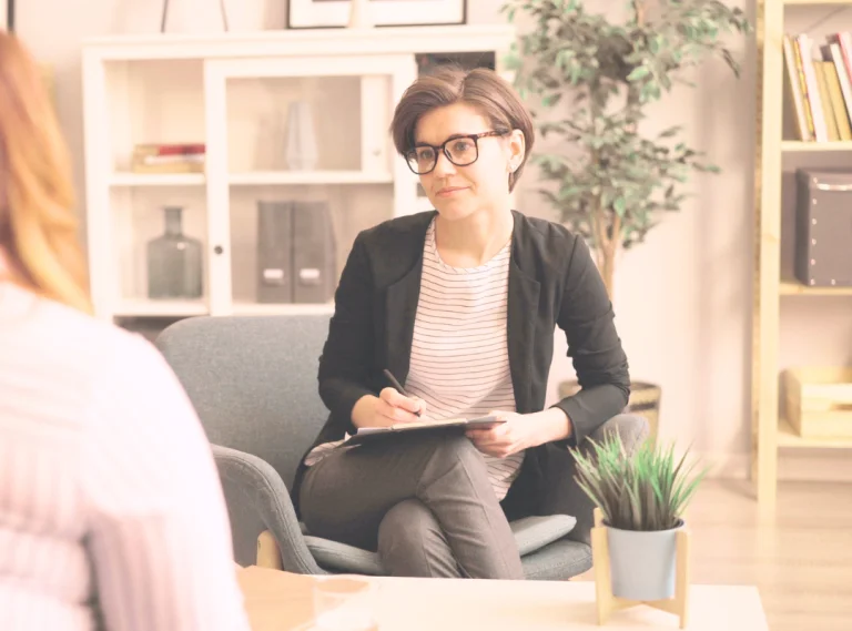 Therapist listening during a private counselling session